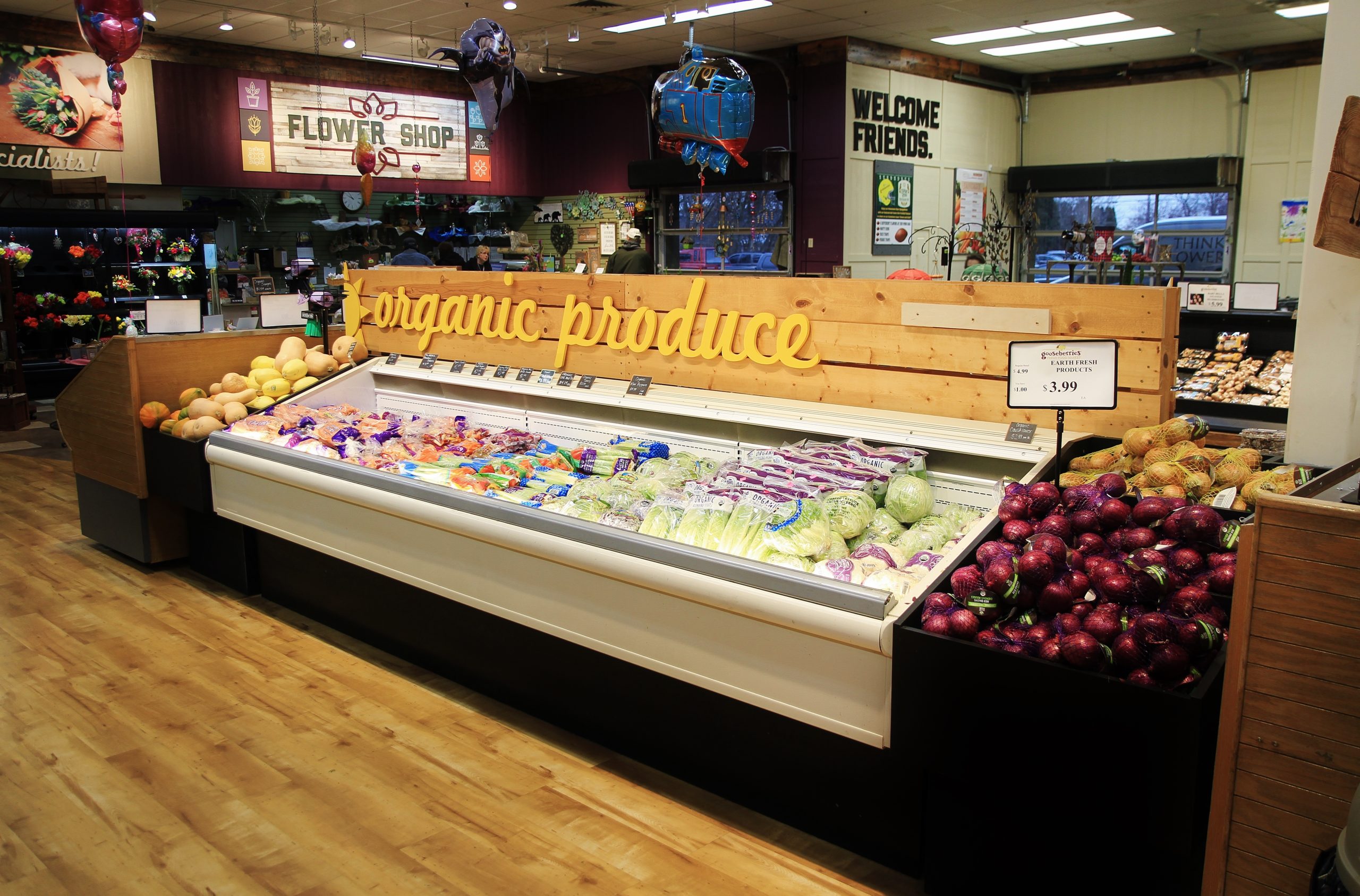 StoreMasters integrated a specialty floral department into the produce department to expand on the freshness component